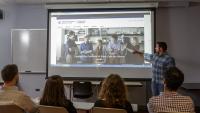 A web services team member presenting in a on-site training session.